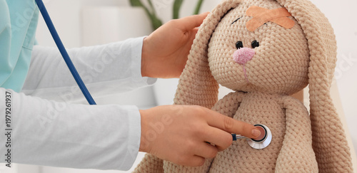 Female pediatrician with st...