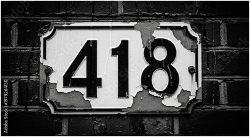 Weathered house number plate displaying the digits four, one, and eight.