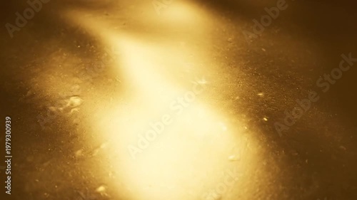High resolution gold colored background with a soft gradient transition from light yellow to deep amber, featuring a smooth texture and a subtle metallic sheen for backdrop use.