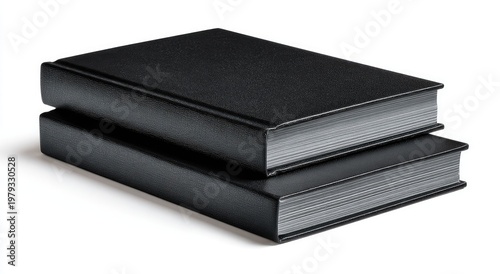 Two stacked, closed, black hardbound books with crisp white pages
