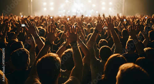 Dynamic outdoor music concert with spectacular stage, vibrant light display, and pyrotechnics exciting an audience