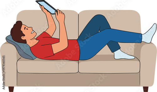 A man lies on a couch reading a tablet in a relaxed living room environment.