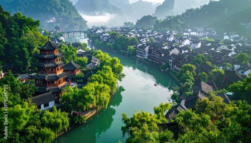 A picturesque aerial view showcases a traditional Chinese water town nestled amidst lush green hills and a tranquil river, highlighting its unique architecture and serene atmosphere.