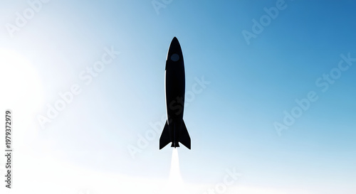 Rocket Launch Against the Sky: The silhouette of a rocket gracefully ascends into a clear blue sky, igniting a trail of vapor and smoke. Its upward trajectory symbolizes progress and exploration