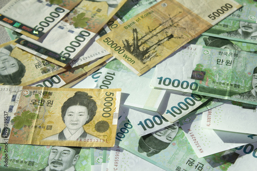 These are South Korean 10,000 won and 50,000 won bills.