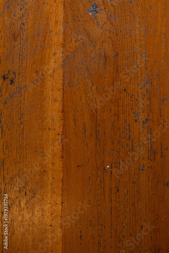 Warm brown polished wooden surface texture background