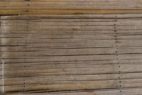Flattened and woven natural bamboo board texture background