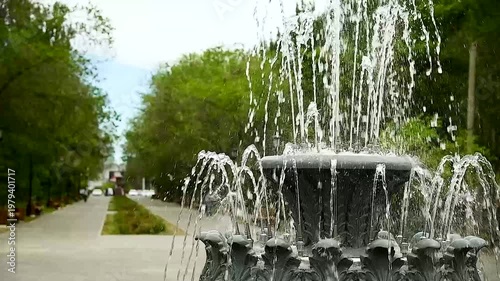 Fountain in the city park in summer