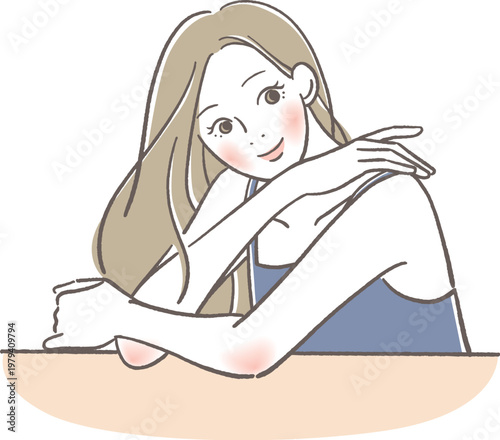 テーブルに肘を付く女性