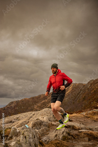 Man running in the mountains of Norway