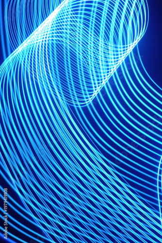 Electric blue light trails against a deep black background