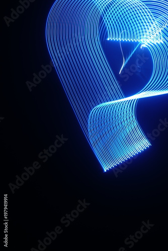 Electric blue light trails against a deep black background