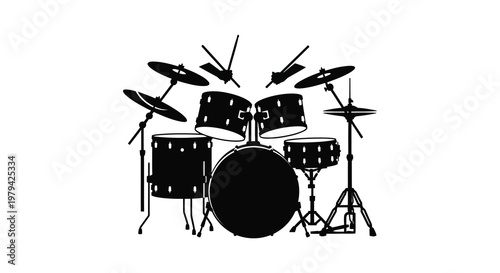 Black silhouette of a complete drum kit against a stark white background silhouette