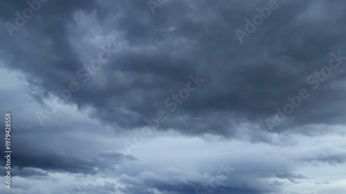 Dramatic Timelapse of Stormy Dark Clouds Moving Across Overcast Sky