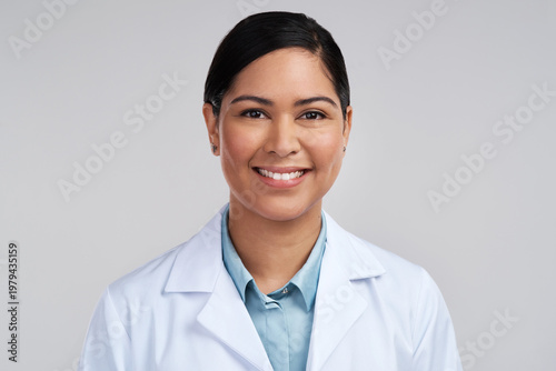 Fotografie Portrait, scientist and woman with smile in studio, professional and confident for medical innovation