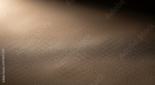 Brown textured background with light beam.