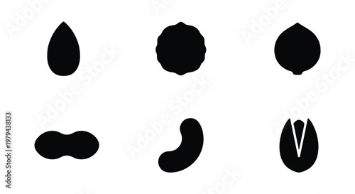 Minimalist nut silhouette icons set, black almond and walnut shapes, organic peanut and cashew vector elements, 6 healthy snack food symbols