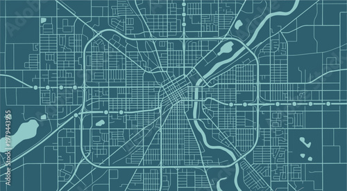 City map featuring a complex urban grid is presented in a monochromatic teal color scheme for architectural planning.