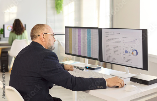 фотографія Analyst accountant performs finance analysis in office