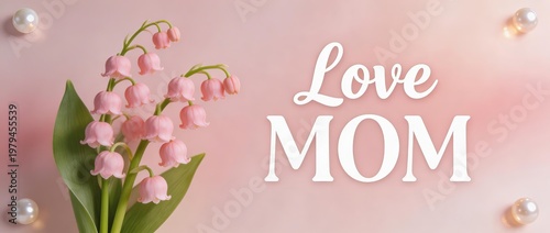 Pink Lily of the Valley flowers with 'Love MOM' text on soft pink background, ideal for Mother's Day greeting cards or celebrations, symbolizing love and affection.