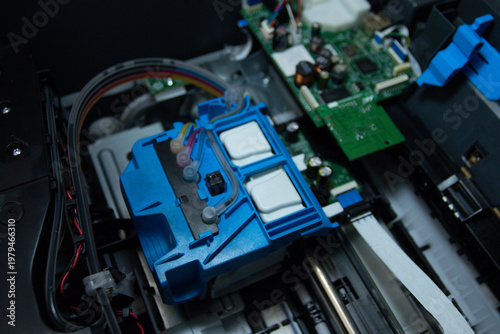 inside printer electronic circuit board with cables
