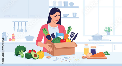 Happy young woman in a modern kitchen unpacking a delivery box filled with a variety of fresh organic vegetables and healthy food.