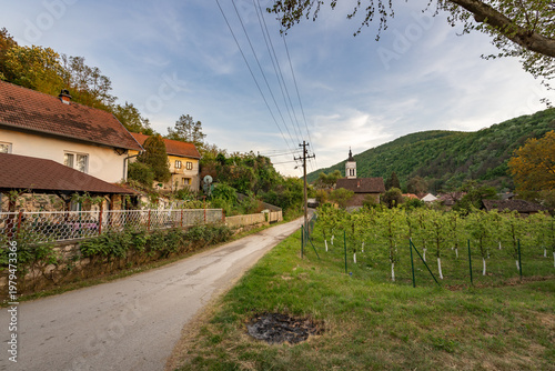Wallpaper Mural Small town with a road and a house with a red roof Torontodigital.ca