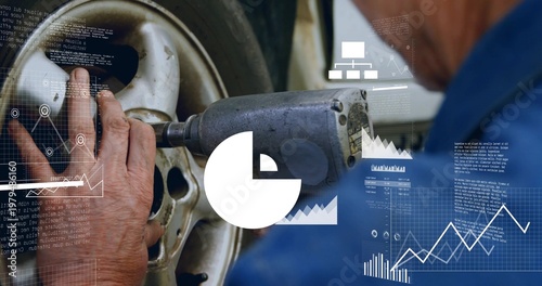 Fotografía Tightening blue shirt technician using impact wrench on lug nut at shop, alloy w