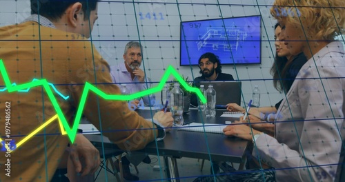 Discussing five professionals in business writing around table in office, with blueprint overlay