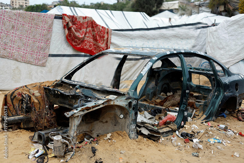Destroyed car in Gaza refugee camp
