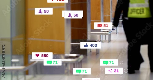 Cam tracking vested team walking hall, notifications growing, cascading, clearing, showing clutter
