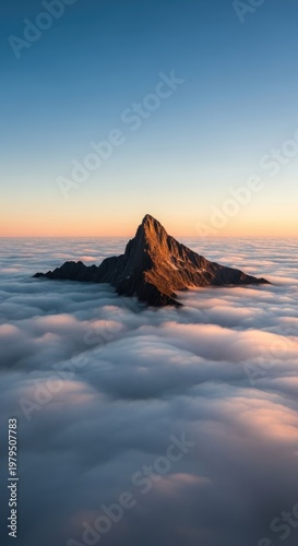 Majestic Mountain Peak Above the Clouds.