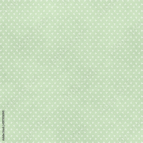 Green textured background with small multicolor polka dots, playful and modern design perfect for fabric prints, kids products, packaging, and creative layouts.