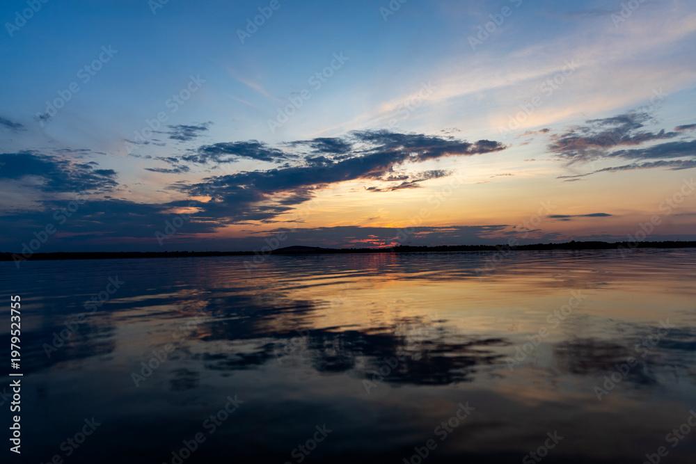 Obraz premium Colorful sunset over the lake. Mietkowski Lake, Poland