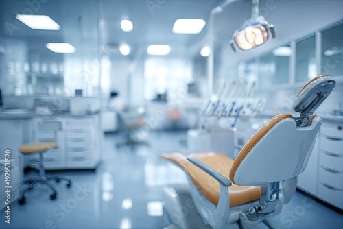 A modern, bright, and empty dental office with an orange examination chair and sterile tools