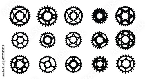 Arrangement of black bicycle chainrings displayed as a striking silhouette
