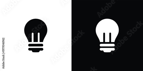 Black and white light bulb on split color background symbol idea