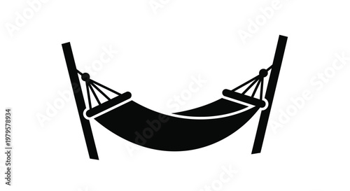 Black hammock suspended between two posts a peaceful outdoor scene silhouette