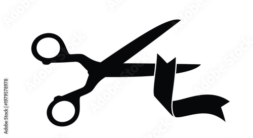 Black scissors cutting a ribbon a striking graphic silhouette
