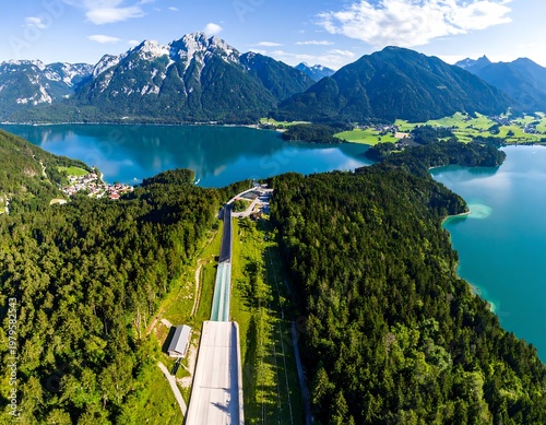 Scenic Alpine Lake and Forest Landscape with Mountain Backdrop.