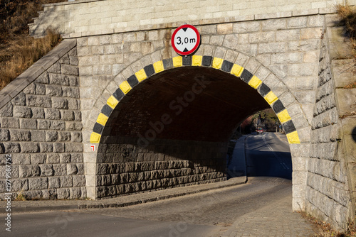 Canvastavla Stone arch underpass with a prominent 3
