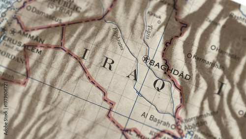 Tableau sur toile Macro close up of a vintage map highlighting Iraq, showcasing detailed cartography, major regions and cities, and classic antique textures ideal for travel, geography, and historical themes