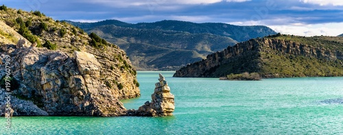 Panoramic View of the Torreon Rock Peak at Cueva Foradada Reservoir in Oliete Spain