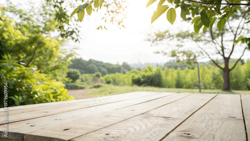 Wallpaper Mural Wooden table surface with green trees and bright natural outdoor background creating peaceful and fresh atmosphere Torontodigital.ca