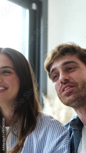 Happy Young Couple Sharing a Laugh and Sweet Moments Together at Home