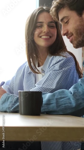 Happy Young Couple Enjoys a Sweet Morning Moment Together, Sharing Laughter and Casual Conversation.