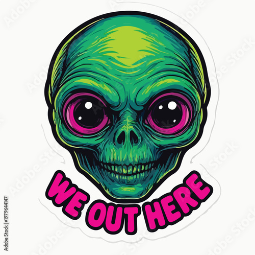 A vibrant green alien head graphic design featuring large pink eyes and a catchy 'WE OUT HERE' text, perfect for merchandise.