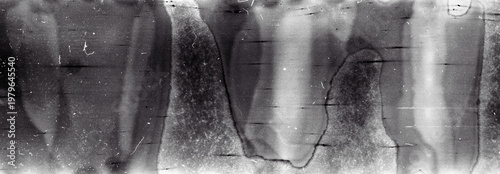 Blank grained film strip texture background with heavy grain, dust and light leak