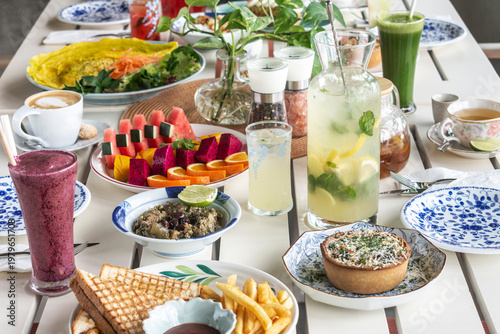 mixed western healthy food meal on restaurant table outdoors in singapore restaurant