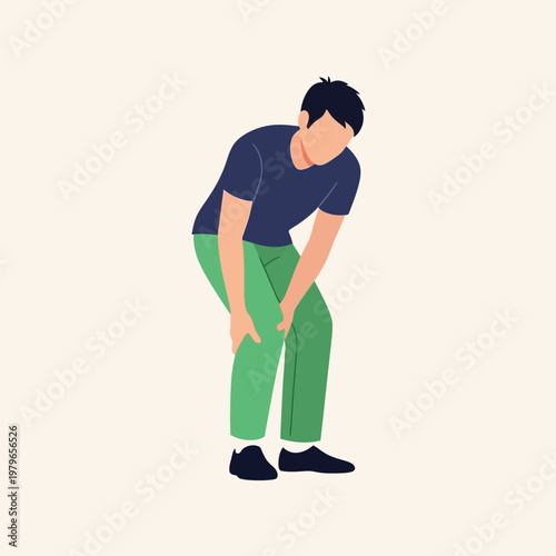 Man holding knee in pain, suffering from injury or joint problem, isolated on beige background